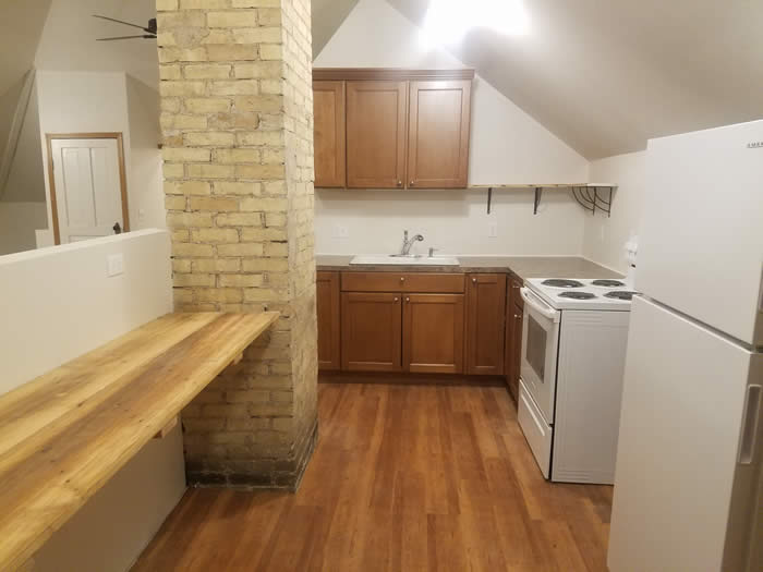 View looking at the kitchen of apt 7